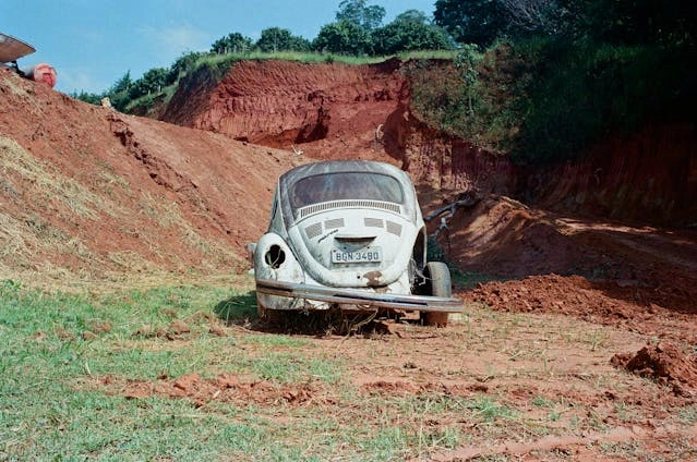 website maintenance beat up vw beetle